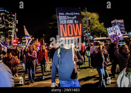 Tel Aviv, Israel. 26th Mar, 2024. A man holds up a placard during a protest calling on the government to reach a hostage release deal with Hamas. Israel on Tuesday recalled its negotiating team from Qatar after Hamas rejected its latest offer in talks on a hostage deal and truce. Credit: SOPA Images Limited/Alamy Live News Stock Photo