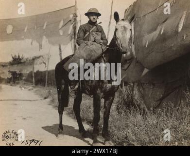 Private Henry G. Knack; Machine Gun Company; 128th Infantry, 32nd division, carrying mail to the men in the trenches; near Austerlitz Woods, Germany ca. 1918 Stock Photo
