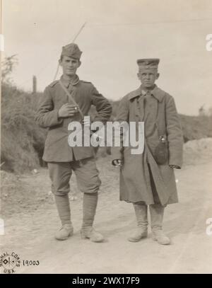 Two 18 year old German prisoners. They had been in the army six months and on their first day in the trenches, were captured ca. 1918 Stock Photo
