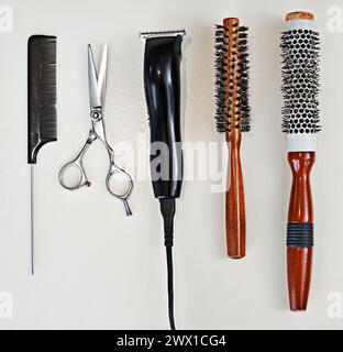 Scissors, equipment and tool for haircut, comb and razor for professional hairdresser. Metal, grooming and trim or cut from beautician or haircare Stock Photo