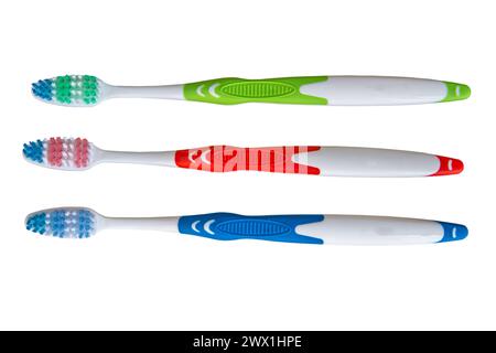 three toothbrushes on a white background Stock Photo
