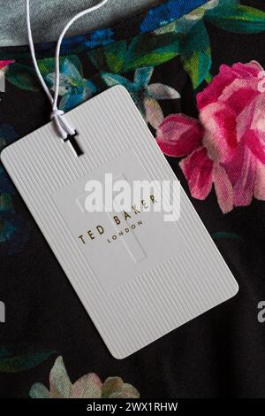 Ted Baker London label tag in womans multi-coloured t-shirt top - sold in the UK United Kingdom, Great Britain Stock Photo