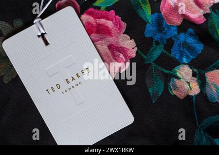 Ted Baker London label tag in womans multi-coloured t-shirt top - sold in the UK United Kingdom, Great Britain Stock Photo