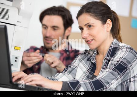 close up of businesspeople working on laptop Stock Photo