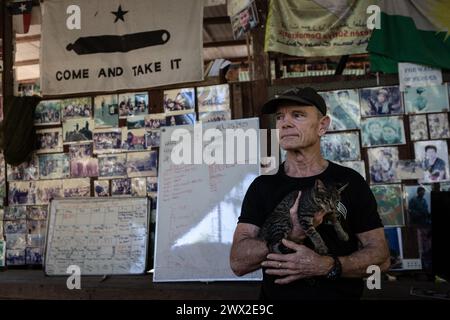 © Chris Huby/Le Pictorium/MAXPPP - 30/12/2023 Chris Huby/Le Pictorium - 30/12/2023 - Birmanie/Karen (region) - Camp des Free Burma Rangers - Reunion des FBR dans le grand bureau du camp qui affiche aussi de vieilles photos souvenir. Des campements de refugies aux villages bombardes, rencontre avec une population martyrisee par la junte et decouverte de l'action humanitaire des FBR. La Birmanie continue sa descente aux enfers depuis trois ans, dans une indifference quasi totale, et il est important de rapporter l'engagement des FBR aupres de ce peuple qui compte plus que jamais Stock Photo