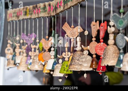 Beautiful ceramic traditional bells in a folk arts and crafts fair or market in Vilnius, Lithuania, Europe Stock Photo