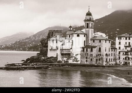 Camogli Italy shoreline a colorful peaceful seaside village in Liguria Italy. A tranquil quiet village of houses and resturaunts. Stock Photo
