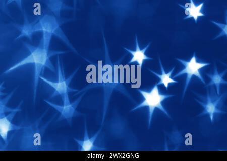 Holiday background with glowing stars Stock Photo