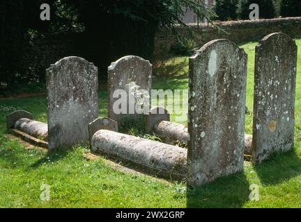 St Peter's & St Paul's church, Albury Park, Guildford, Surrey Group of 4 graves with head & footstones. Stock Photo