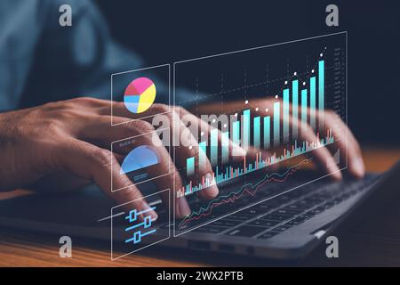 businessman analyzing business Enterprise data management, business analytics with charts, metrics and KPIs to improve organizational performance, mar Stock Photo