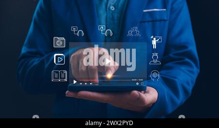 Person who attends online lessons on a virtual screen tablet. E-learning education, internet lessons and online webinar. Education internet Technology Stock Photo