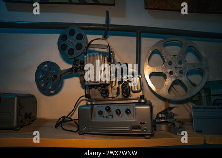 Vintage movie camera with film charged on reels. High quality photo Stock Photo