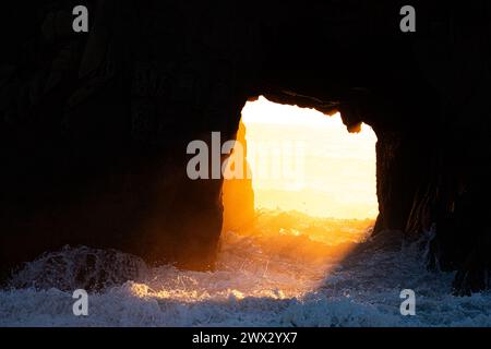 Sunset illuminates the Window in the Rock feature of Keyhole Arch at ...