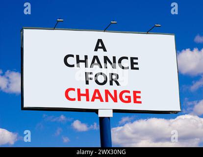 A chance for change symbol. Concept words A chance for change on beautiful big white billboard. Beautiful blue sky cloud background. Business A chance Stock Photo