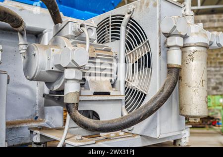Rear view of an industrial fan in paving factory. Industrial background Stock Photo