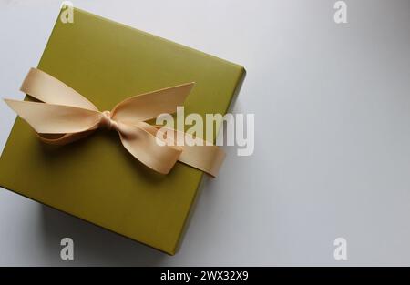 Elegant Gift Box On A White Surface Top View Concept Photo For Greeting Cards Or Holiday Backgrounds Stock Photo
