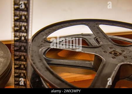 Real 35 mm film projector tape in the old studio Stock Photo