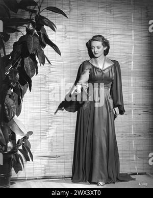 Publicity Portrait of BETTE DAVIS as Leslie Crosbie in THE LETTER 1940 Director WILLIAM WYLER From the play by W. SOMERSET MAUGHAM Screenplay HOWARD KOCH Costume Design ORRY-KELLY Director of Photography TONY GAUDIO Music MAX STEINER Warner Brothers Stock Photo