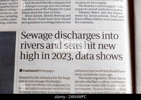 'Sewage discharges into rivers and seas hit new high in 2023, data shows' Guardian newspaper headline Thames Water article 27 March 2024 London UK Stock Photo