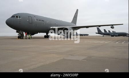 A KC-46A Pegasus with Wing Aerial Refueling Pods attached takes off ...