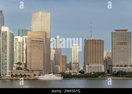 Miami, Florida, USA - July 29, 2023: Coastline Intercontinental hotel among more skyscraper buildings to 50 Biscayne. Seafair Yachts docked near Bayfr Stock Photo
