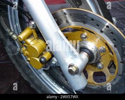 disc brake and caliper of a motorcycle wheel Stock Photo