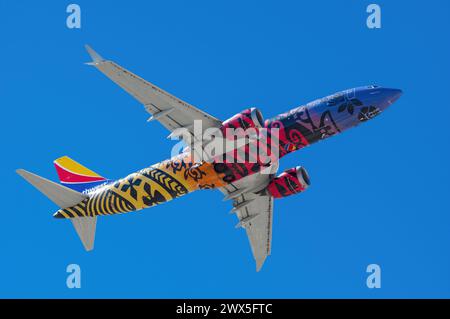 Southwest Airlines Boeing 737 Max 8 N8710M, Imua One livery shown leaving from LAS, Harry Reid International Airport. Stock Photo