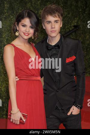 MIAMI, FL - AUGUST 07:  Young sweethearts Justin Bieber and Selena Gomez have reportedly broken up after the Disney star told Justin she didn't approve of his new hip-hop music friends. The Wizards Of Waverley Place star, who has been dating the Baby singer since the start of the year, has allegedly dumped the 17-year-old teen sensation because she is worried about the influence his new friends are having on him.In recent weeks, Justin has been spending more time publicly with Sean Kingston, rapper Lil Wayne, and singer Chris Brown who has a new song with the Canadian teenager. Chris Brown bec Stock Photo