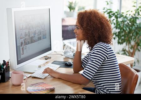 Graphic designer, work and computer in office with screen, digital and editing for web design. Media, professional and desktop at workplace, creative Stock Photo