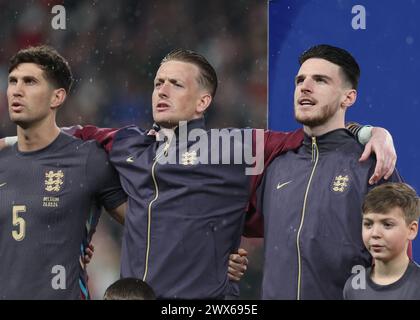 London, UK. 26th Mar, 2024. (L-R) John Stones, Jordan Pickford and Declan Rice of England during the International Friendly match at Wembley Stadium, London. Picture credit should read: Paul Terry/Sportimage Credit: Sportimage Ltd/Alamy Live News Stock Photo