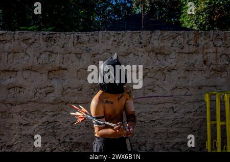 Mandaluyong City, Philippines. 28th Mar, 2024. A devotee whips his back with bamboo sticks on Maundy Thursday. Many Filipino Catholic devotees spend their Holy Week by doing different forms of physical penance to repent for their sins. Credit: SOPA Images Limited/Alamy Live News Stock Photo