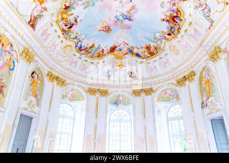 The Baroque Pavilion at Melk Abbey showcases a lavish frescoed ceiling with vibrant colors, intricate detail, and grandeur that captivates the eye. Stock Photo