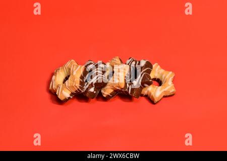 In one row there are shortbread cookies with and without chocolate. Stock Photo