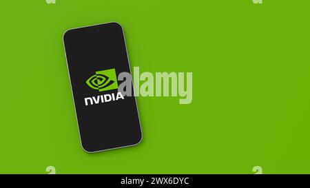 Nvidia Logo on Mobile Phone Screen on Green Background with Copy Space Stock Photo