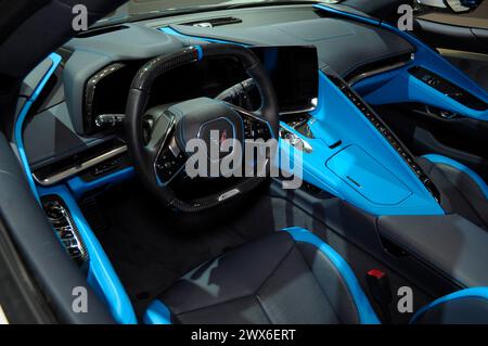 The interior of the 2024 Chevrolet Corvette E-Ray convertible vehicle is seen on the first media day at the 2024 New York International Auto Show in the Jacob K. Javits Convention Center. The annual NYIAS in Manhattan, New York City featured various car companies, debuts of new vehicles and automobile industry professionals. The show which opens to the public on March 29 and ends on April 7, attracts thousands of car enthusiasts. The NYIAS began in 1900 showcasing automobiles and examples of future car technology. Stock Photo