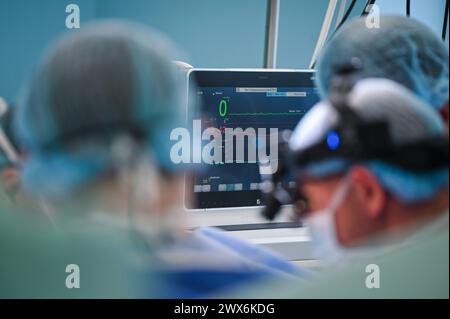 LVIV, UKRAINE - MARCH 27, 2024 - Cardiac surgeons of St. Panteleimon Clinical Hospital together with specialists from the Amosov National Institute of Cardiovascular Surgery perform an open-heart surgery using the Ferrazzi method for the first time in Lviv, western Ukraine. Stock Photo