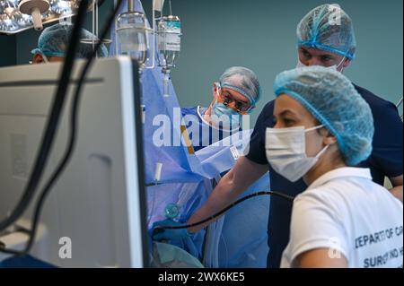 LVIV, UKRAINE - MARCH 27, 2024 - Cardiac surgeons of St. Panteleimon Clinical Hospital together with specialists from the Amosov National Institute of Cardiovascular Surgery perform an open-heart surgery using the Ferrazzi method for the first time in Lviv, western Ukraine. Stock Photo