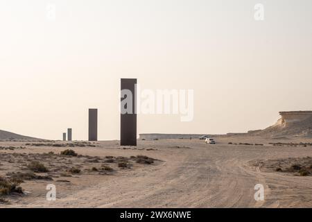 Brouq, Qatar. 28th Mar, 2024. File photo dated November 19, 2021 shows the ‘East-West/West-East' sculpture by American artist Richard Serra, in Qatar's Brouq nature reserve, one hour drive west of the capital Doha. The work is composed of four steel plates, each over fourteen metres in height, in the middle of the desert. Richard Serra just passed away, in March 2024, at the age of 85. Photo by Balkis Press/ABACAPRESS.COM Credit: Abaca Press/Alamy Live News Stock Photo