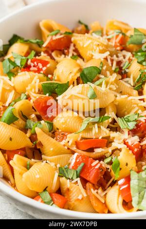 Italian Homemade Chonchiglie Pasta with Tomato and Basil Stock Photo