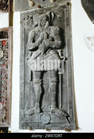 St Nun's church, Pelynt, Looe, Cornwall. Top of dismantled tomb chest of William Achym (1589) attached to south wall of the Chancel. Stock Photo