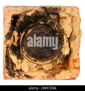Old orange furnace tile isolated on white background Stock Photo
