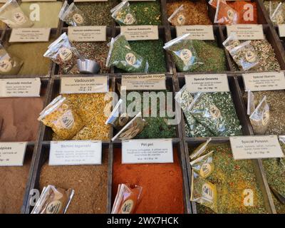 Close-up of a display of various spices packaged for sale on a stall where you can buy all your ingredients & flavourings for French cuisine. Stock Photo