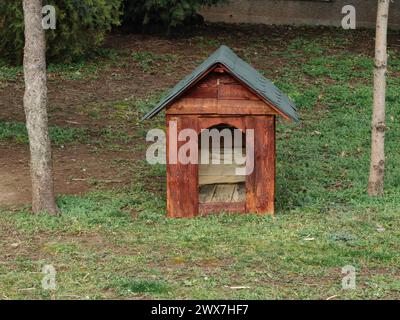 Solo sanctuary. Dog kennel box in the park. Stock Photo