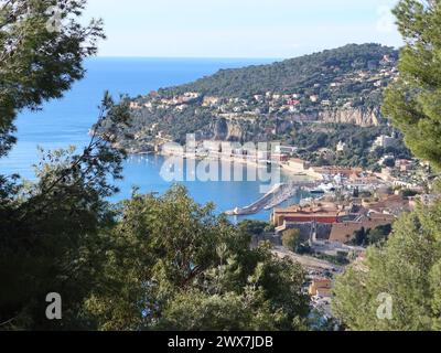 Panoramic view overlooking the French town of Villemarche-sur-Mer with its harbour and Mediterranean coastline on the Cote d'Azur. Stock Photo