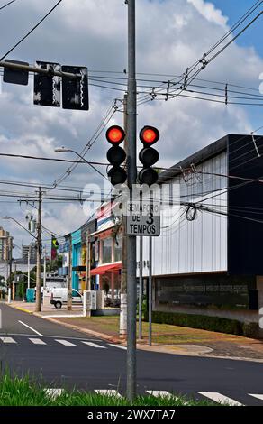 Three-stroke traffic light in Ribeirao Preto, Sao Paulo, Brazil Stock Photo