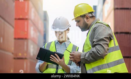 Two individuals using a modern gadget together Stock Photo