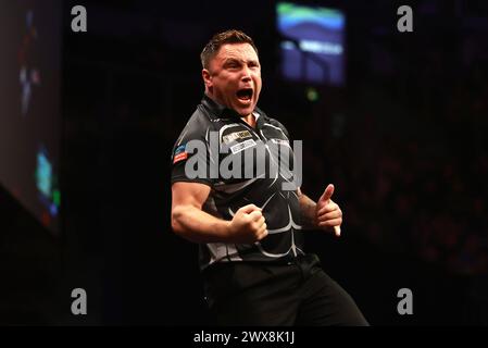 Gerwyn Price celebrates winning night 6 against Luke Littler during the ...