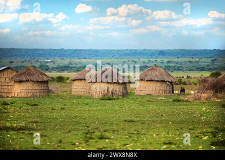 Arusha, Tanzania, Africa. February 03, 2022.life in African village. African travel concept. Round clay houses with grass roof, traditional for Maasai Stock Photo