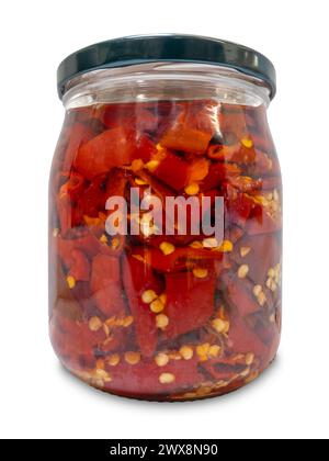 Chilies cut in oil in glass jar isolated on white with clipping path included Stock Photo