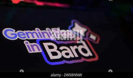 Viersen, Germany - March 9. 2024: Closeup of smartphone on computer keyboard with logo lettering of Gemini pro in Bard Stock Photo